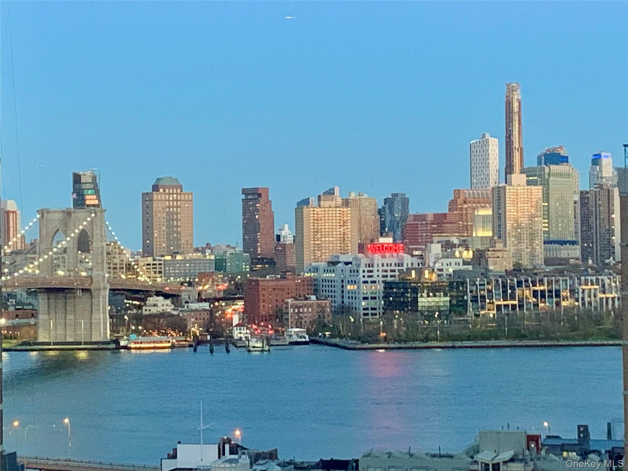 77 Fulton Street, Unit 19C Manhattan, NY 10038 - Photo 13 of 20 a view of a city with tall buildings