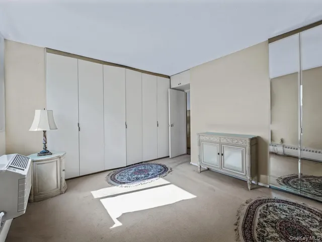 a bathroom with a sink a toilet and vanity