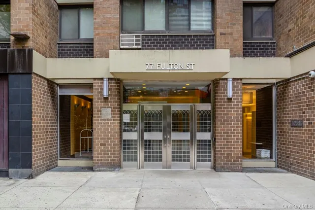 a view of a brick building with a entrance door