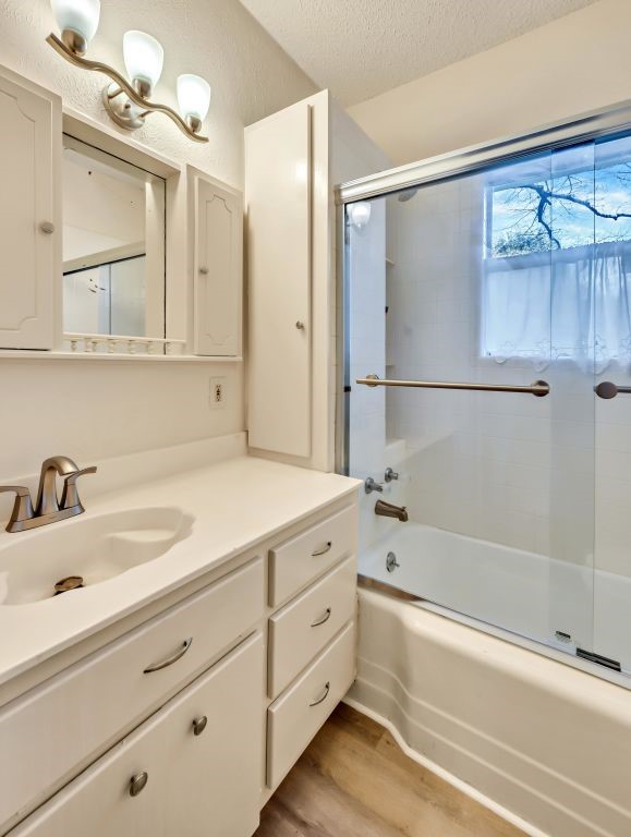 106 30th Street North Waco, TX 76710 - Photo 27 of 47 a bathroom with a tub sink and mirror