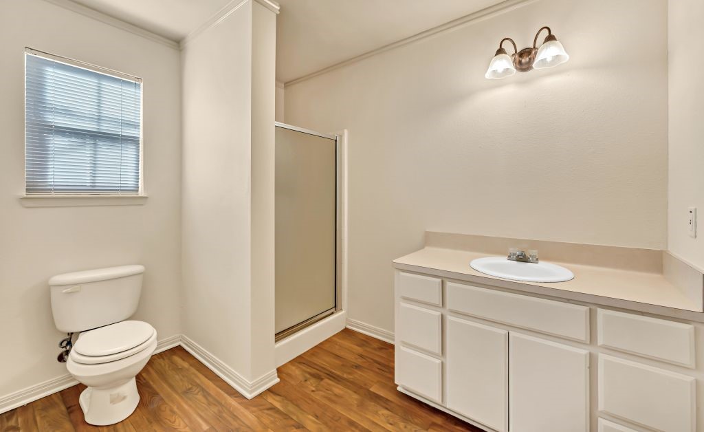 106 30th Street North Waco, TX 76710 - Photo 36 of 47 a bathroom with a sink vanity and a toilet