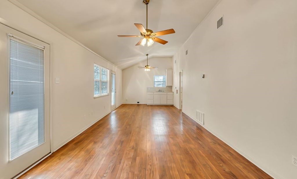 106 30th Street North Waco, TX 76710 - Photo 47 of 47 a view of empty room with wooden floor and fan