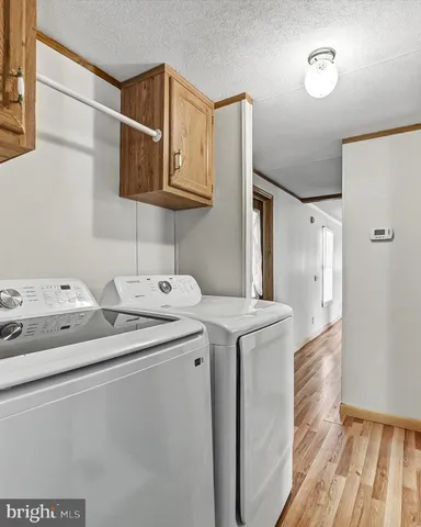 a view of a utility room with washer and dryer