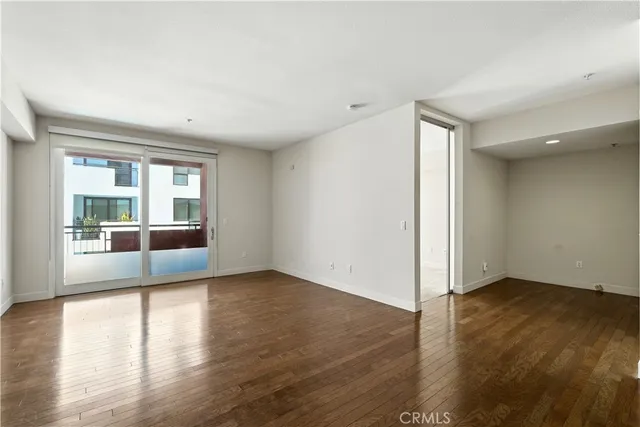 a view of a balcony with a sink and a window