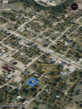 a view of a yard with a trees