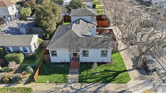 a kitchen with a table and chairs