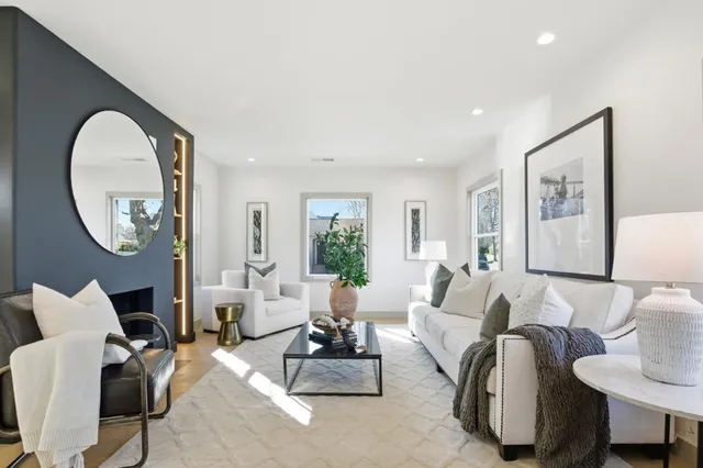 a kitchen with cabinets and window