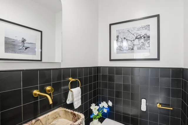 a kitchen with a cabinets and a book shelf