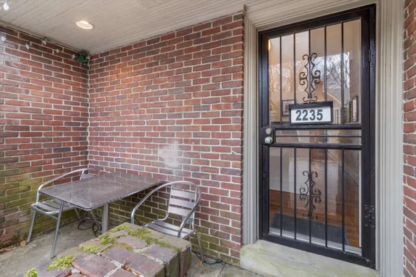 a open kitchen with stainless steel appliances granite countertop a stove and a refrigerator