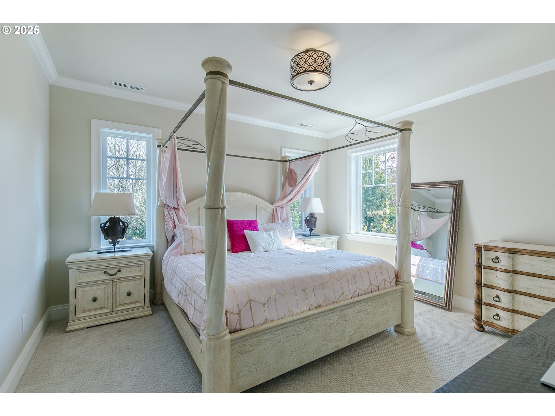27716 Erickson Road Eugene, OR 97402 - Photo 15 of 40 a bedroom with a bed a dresser next to a window