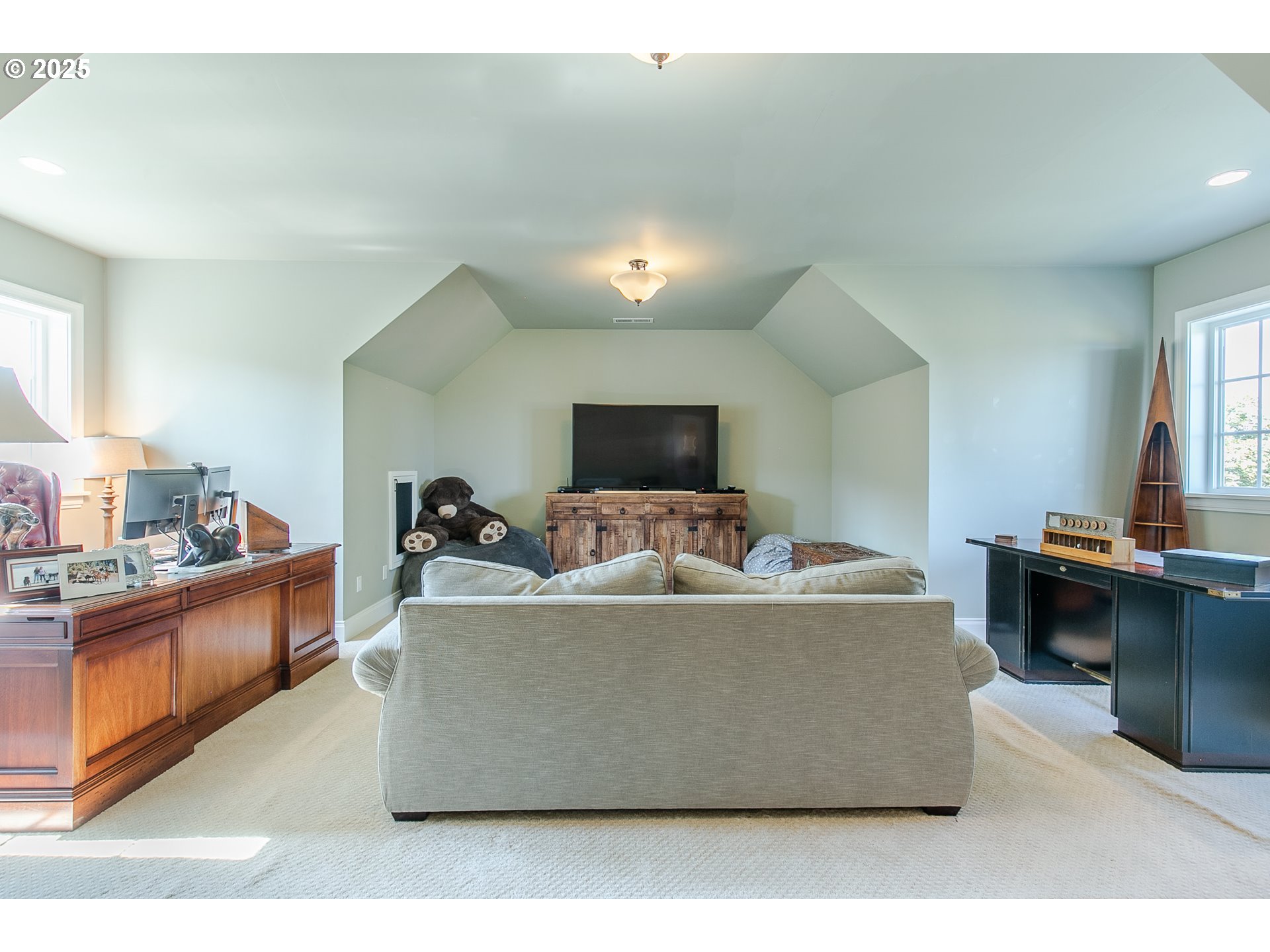 27716 Erickson Road Eugene, OR 97402 - Photo 18 of 40 a living room with furniture and a flat screen tv