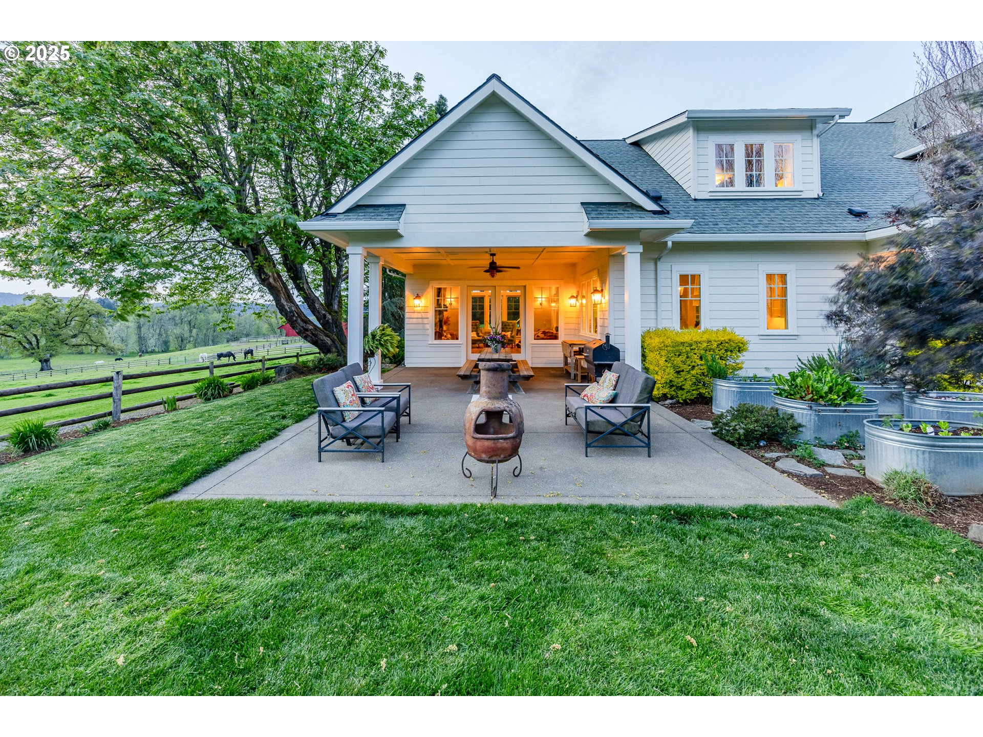 27716 Erickson Road Eugene, OR 97402 - Photo 23 of 40 a backyard of a house with table and chairs