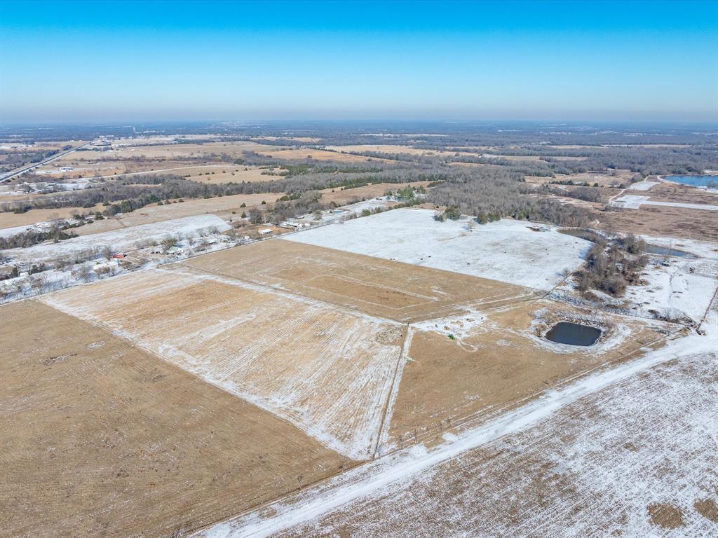 Lot 3 Rains County Road 4330 Point, TX 75472 - Photo 9 of 19 an view of a big room with wooden floor
