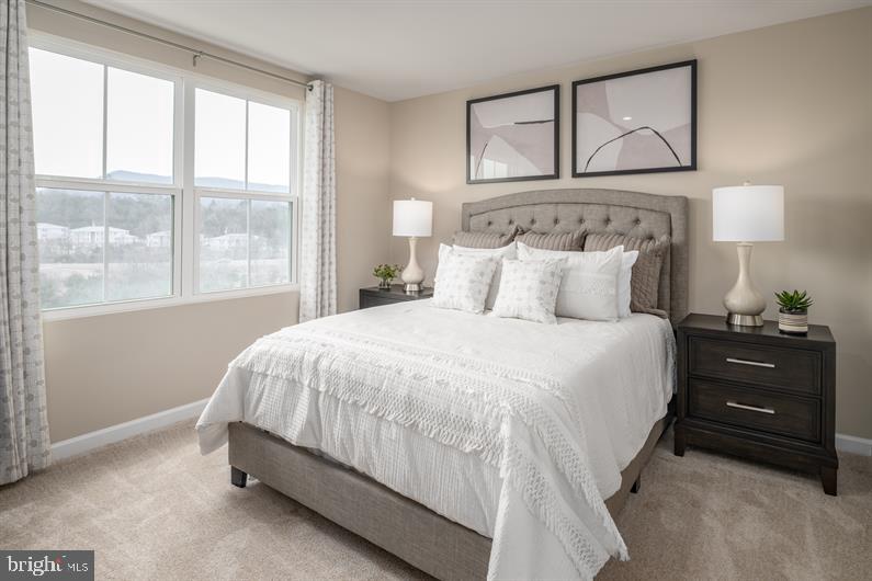 23 Debra Lane, Unit 53B Carlisle, PA 17013 - Photo 11 of 19 a bedroom with a bed and a window