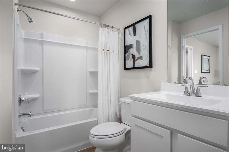 23 Debra Lane, Unit 53B Carlisle, PA 17013 - Photo 14 of 19 a bathroom with a sink toilet and shower