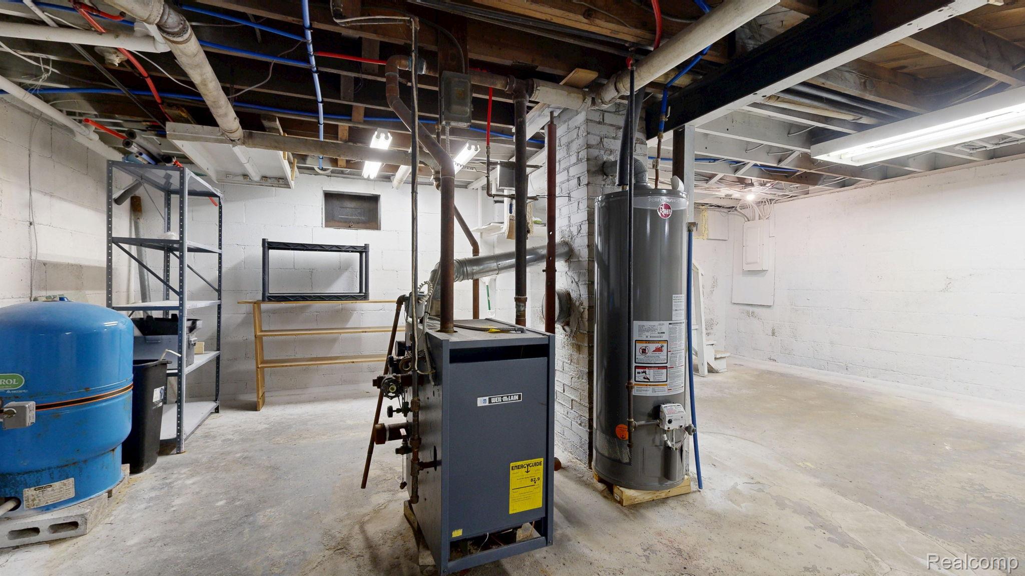 4455 North Genesee Road Flint, MI 48506 - Photo 27 of 47 Utilities with water heater and a heating unit