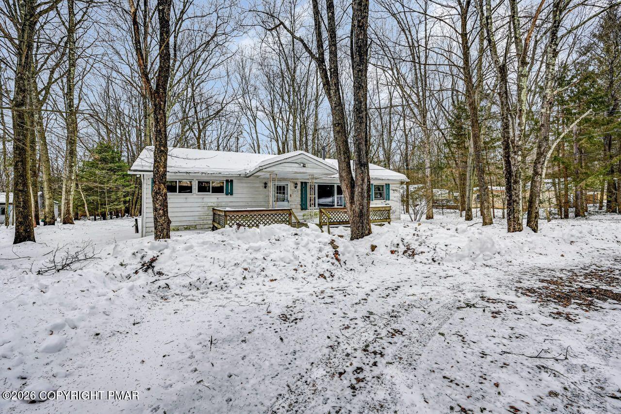 1912 Johns Road Effort, PA 18330 - Photo 43 of 44 a view of a house with a yard covered in snow
