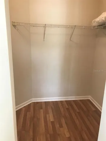 a view of a room with racks on the wall