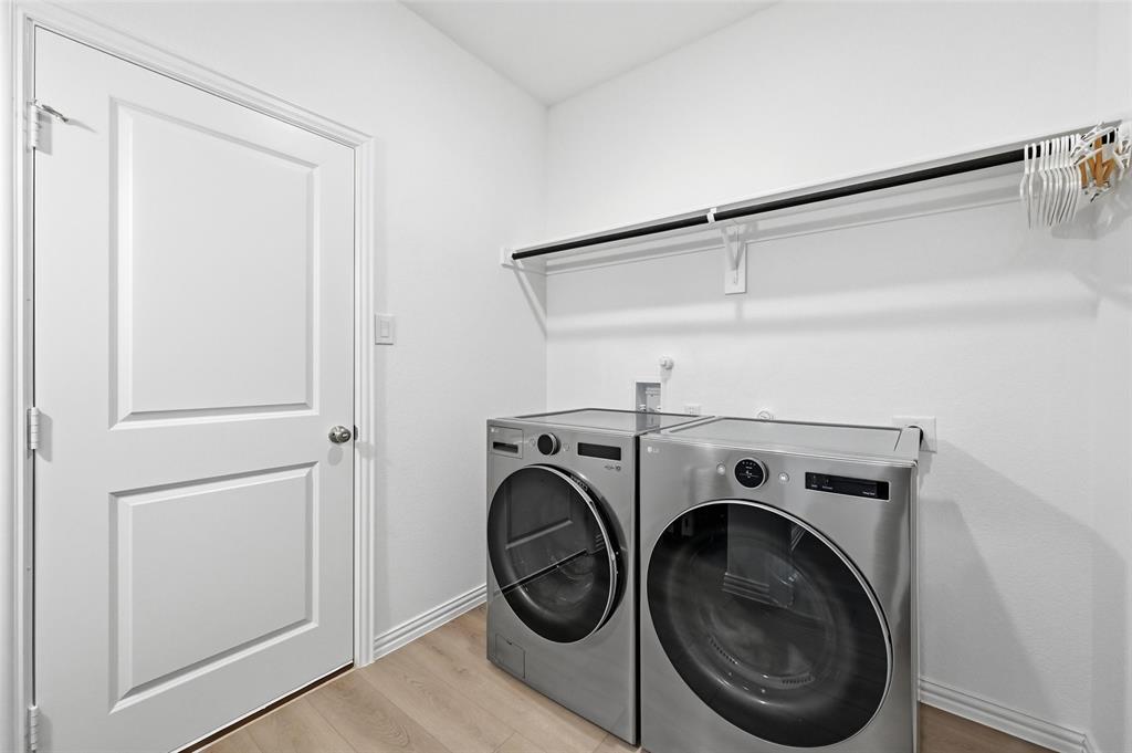 634 Blue Rdg Drive Mansfield, TX 76063 - Photo 15 of 25 a utility room with dryer and washer