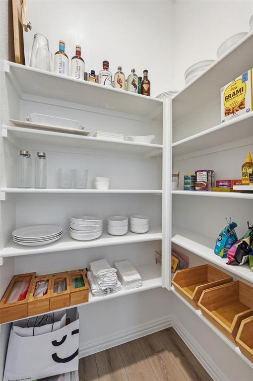 634 Blue Rdg Drive Mansfield, TX 76063 - Photo 9 of 25 a cabinet with white sheets and pillows on it