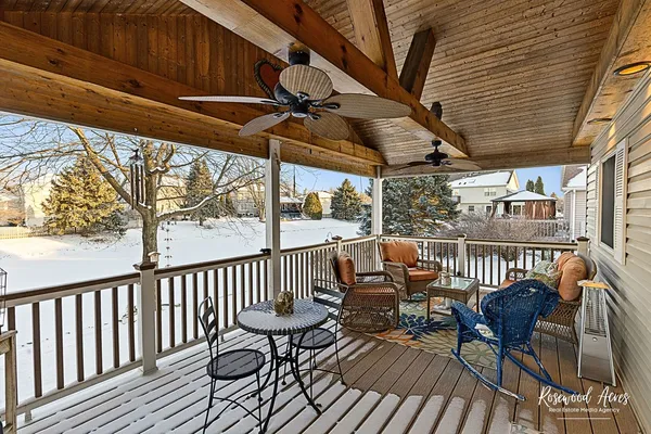 a view of balcony with furniture