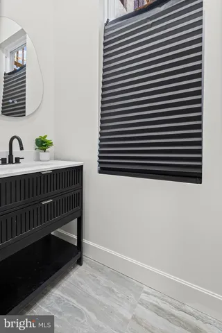 a view of barbeque area and wooden floor