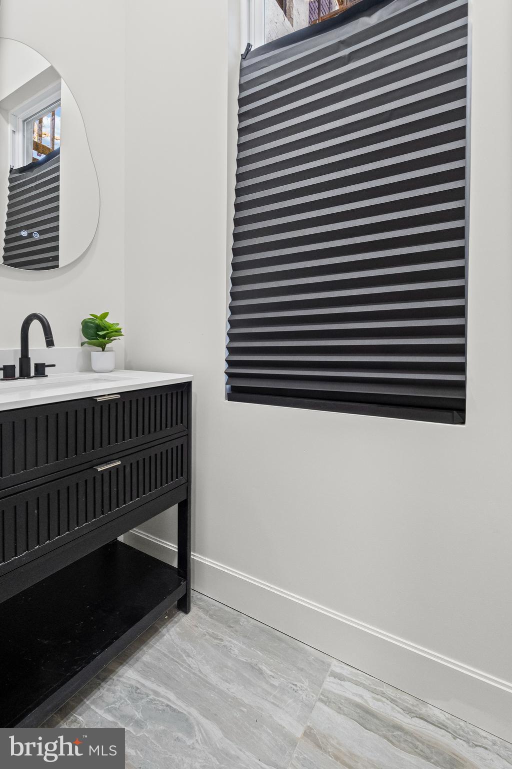 317 South Fulton Avenue Baltimore, MD 21223 - Photo 10 of 44 a view of barbeque area and wooden floor