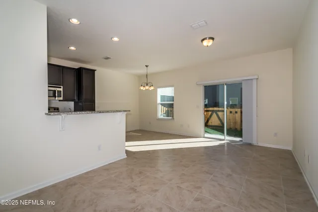 a view of a livingroom with a furniture
