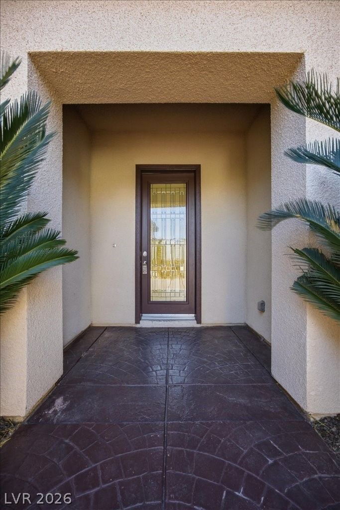 2765 Struan Avenue Henderson, NV 89044 - Photo 2 of 65 Court yard, leading to the main door entrance.