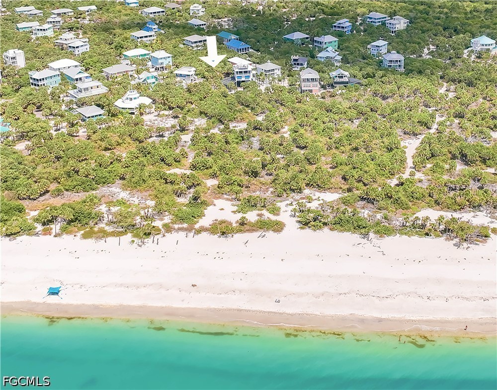 4491 Butterfly Shell Drive Upper Captiva, FL 33924 - Photo 11 of 27 a view of yard with beach and green space