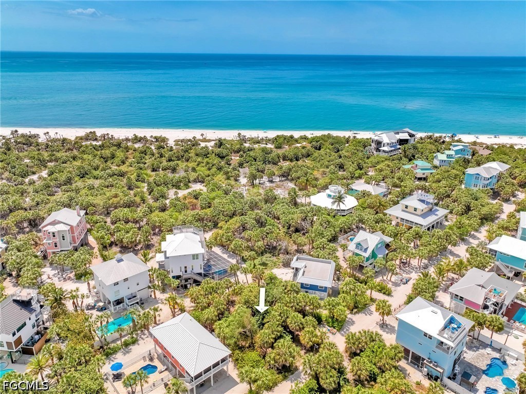 4491 Butterfly Shell Drive Upper Captiva, FL 33924 - Photo 4 of 27 a view of a city