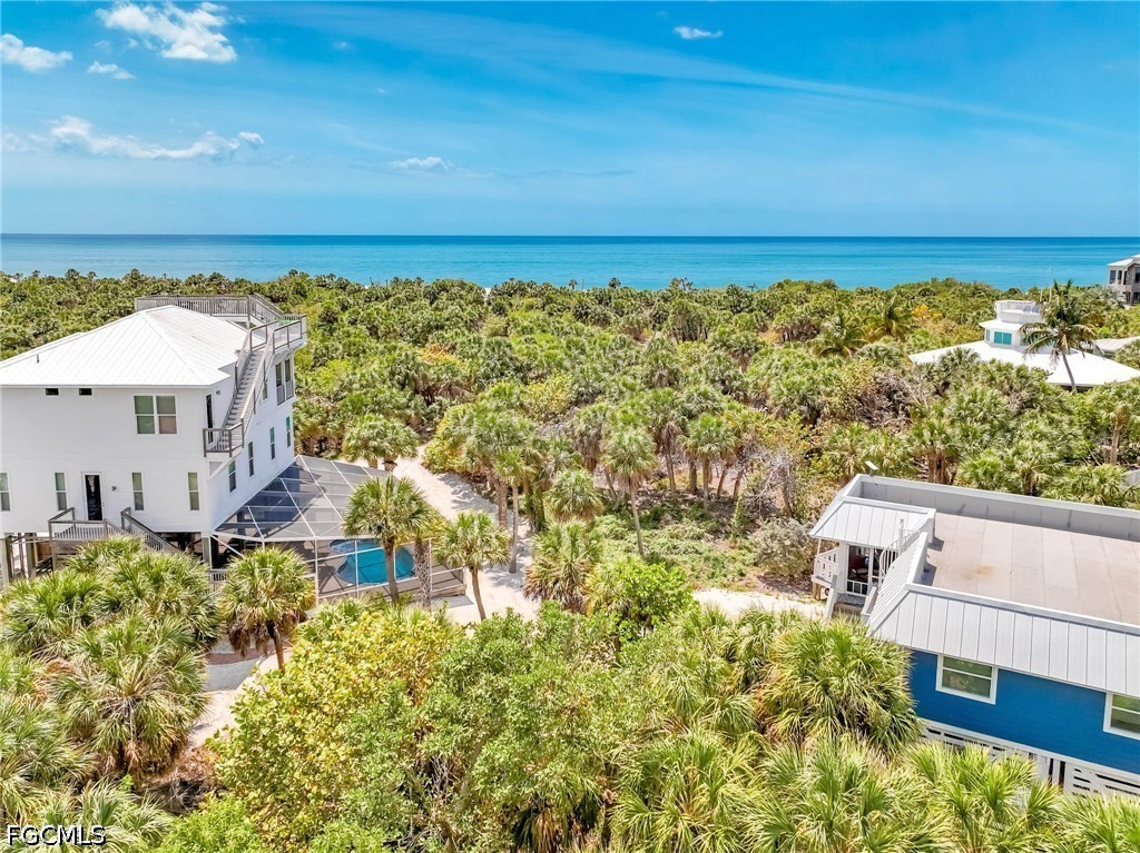 4491 Butterfly Shell Drive Upper Captiva, FL 33924 - Photo 5 of 27 a view of a city with an ocean view