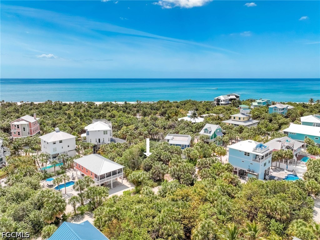 4491 Butterfly Shell Drive Upper Captiva, FL 33924 - Photo 10 of 27 a view of a city with an ocean