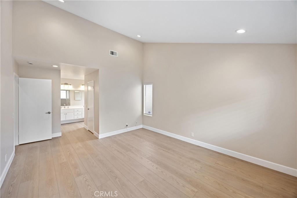 10 Coldstream, Unit 50 Irvine, CA 92604 - Photo 15 of 50 wooden floor in an empty room with a window