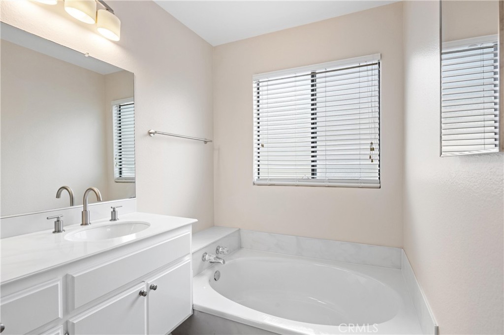 10 Coldstream, Unit 50 Irvine, CA 92604 - Photo 17 of 50 a white bath tub sitting next to a white sink