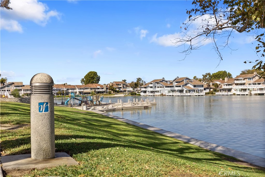 10 Coldstream, Unit 50 Irvine, CA 92604 - Photo 31 of 50 a swimming pool with outdoor seating and yard