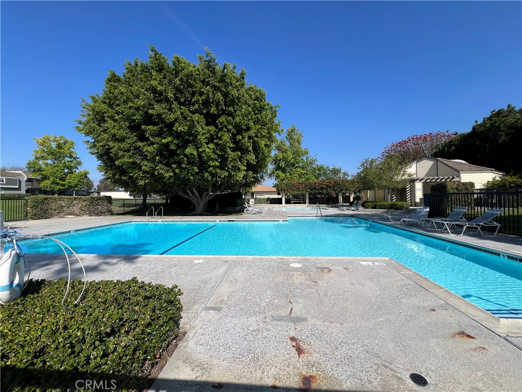 10 Coldstream, Unit 50 Irvine, CA 92604 - Photo 44 of 50 a view of yard with swimming pool and green space