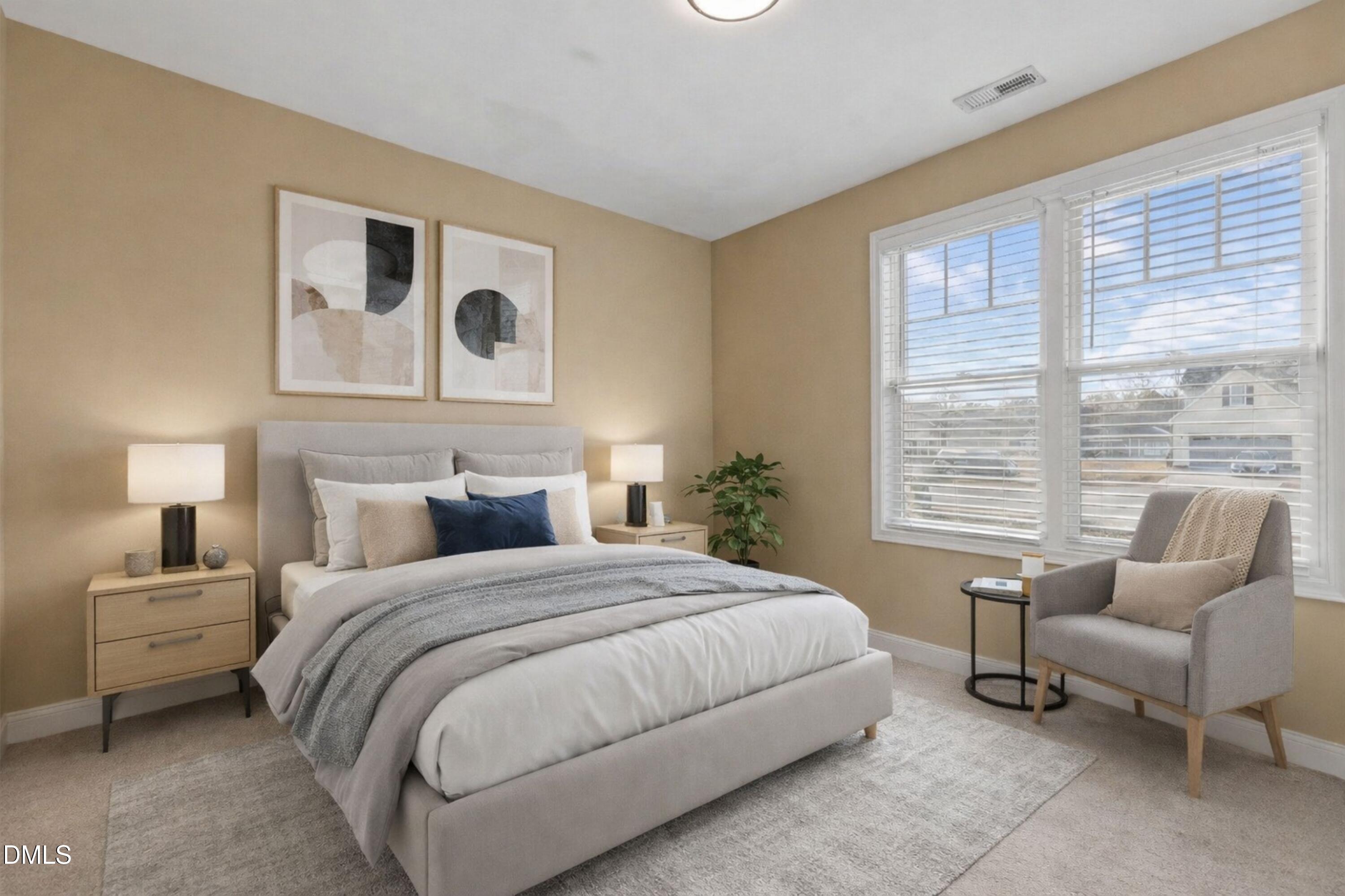 9159 Byron Court Bailey, NC 27807 - Photo 11 of 16 a bedroom with a bed and a couch
