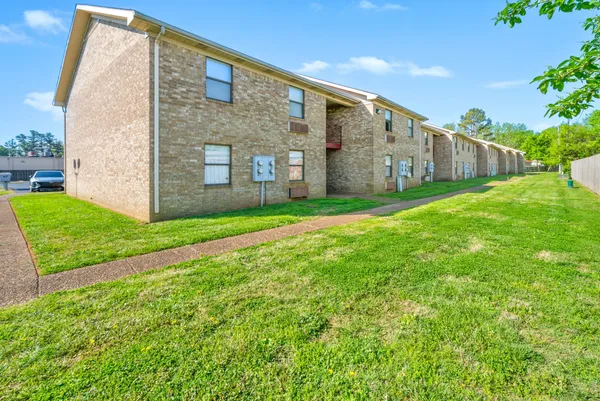a view of a back yard of the house