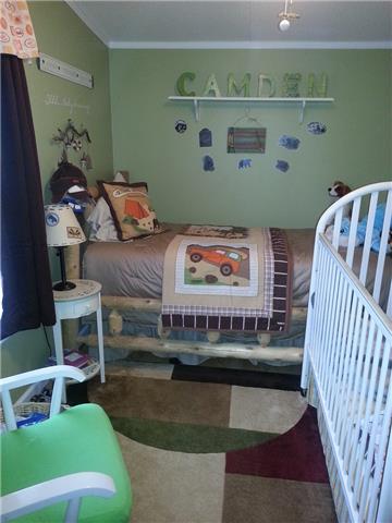 701 Armory Road Monteagle, TN 37356 - Photo 13 of 18 13x10 bedroom 2. There are a total of 3 bedrooms.