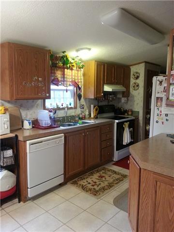 701 Armory Road Monteagle, TN 37356 - Photo 7 of 18 Spacious 11x8 kitchen with lots of counter space for preparing meals.