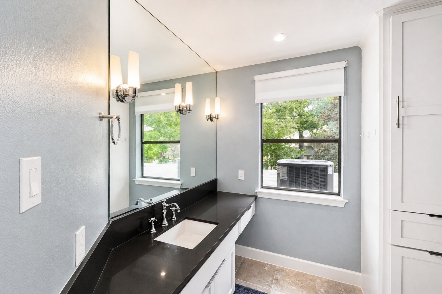 201 Vanderpool Lane, Unit 130 Houston, TX 77024 - Photo 29 of 41 Another full bathroom on the 2nd floor featuring a black granite countertop, built-in linen storage, shower/tub combination and TOTO heated toilet and bidet.