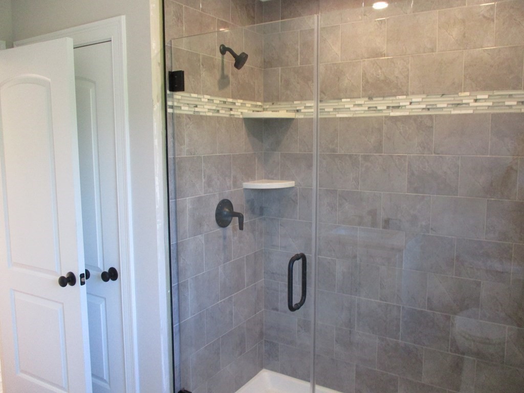 247 High Street Billerica, MA 01862 - Photo 20 of 26 a bathroom with a shower