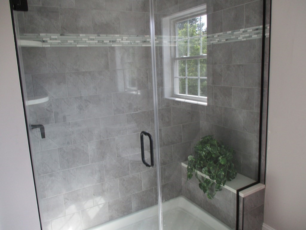247 High Street Billerica, MA 01862 - Photo 21 of 26 a bathroom with a shower