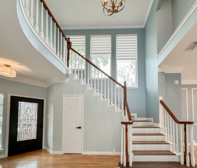 1223 Normans Woods Street Houston, TX 77077 - Photo 9 of 32 The foyer is highlighted by high ceilings & a beautiful stairwell