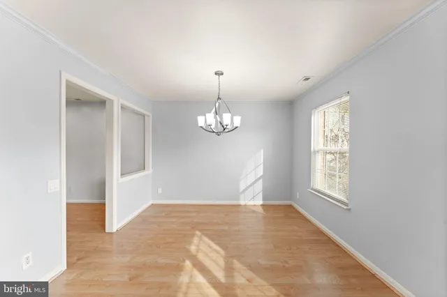 a view of livingroom with hardwood floor and window