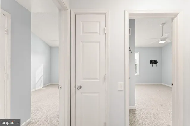 a view of a bathroom with a glass shower door