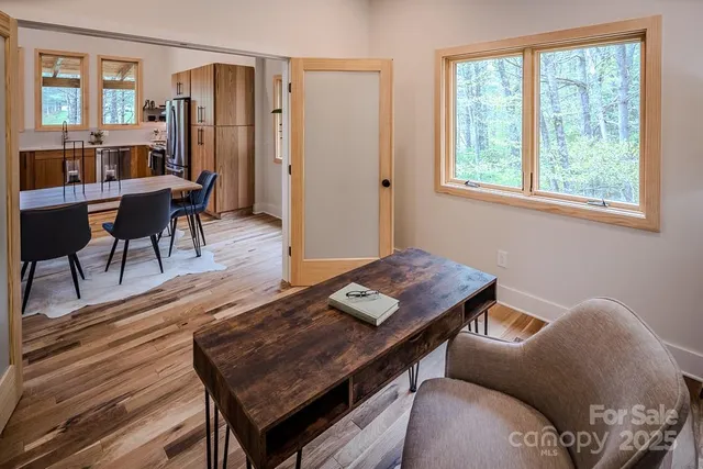 a living room with furniture and a window