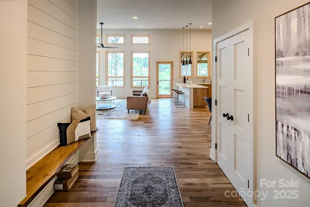 a lobby with furniture and rug
