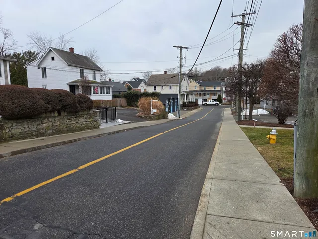 a view of a city street both side of traffic
